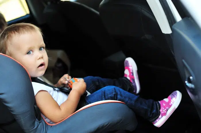 cute girl in car seat